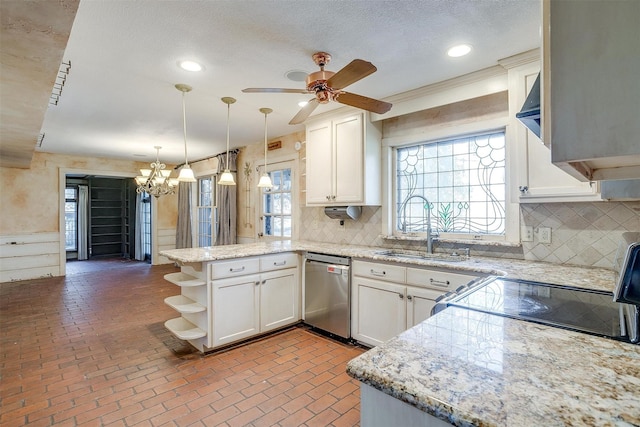 kitchen with brick floor, open shelves, stainless steel dishwasher, a sink, and a peninsula