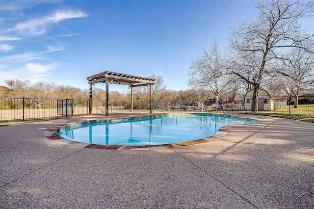 view of swimming pool featuring a fenced in pool, fence, a pergola, and a patio