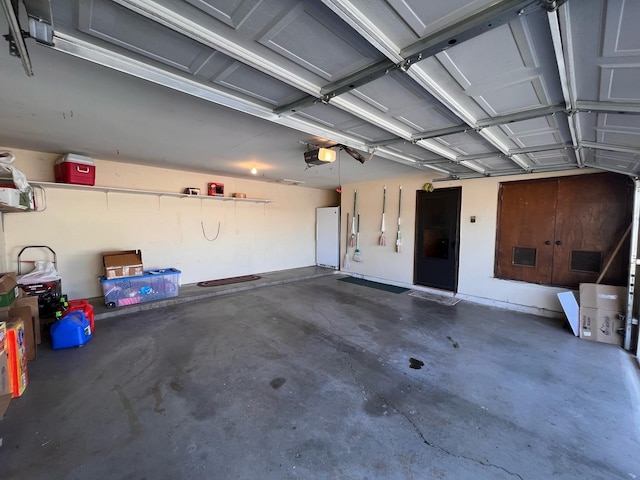 garage featuring a garage door opener