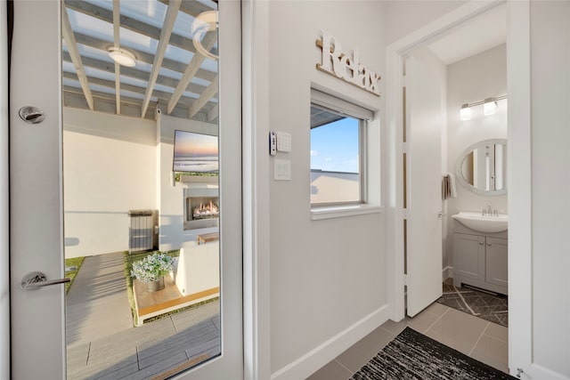 bathroom featuring vanity and tile patterned floors