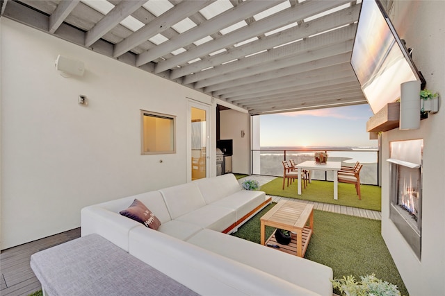 interior space with beam ceiling and wood finished floors