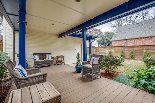 wooden deck featuring fence