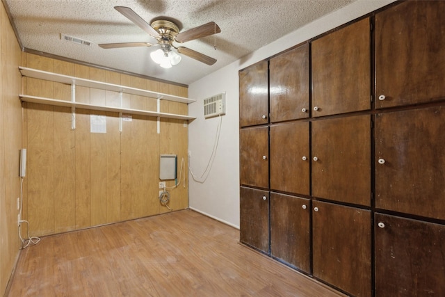 1878 Trail Ridge Dr, Lewisville, TX 75077 - unfurnished bedroom with light wood-type flooring and a textured ceiling
