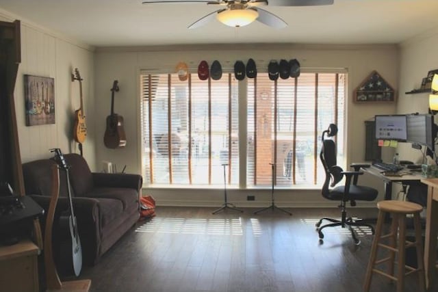 office with a ceiling fan, ornamental molding, and wood finished floors