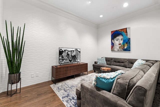 living room with ornamental molding, wood finished floors, and recessed lighting