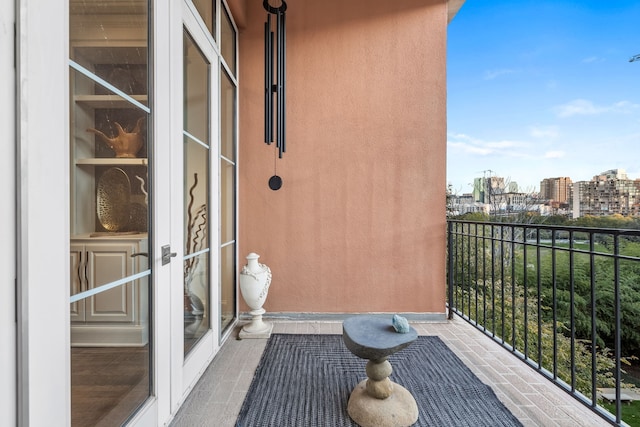 balcony featuring a city view