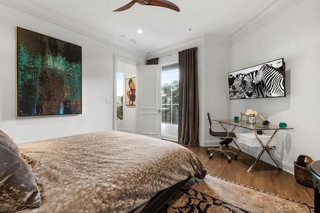 bedroom with recessed lighting, ornamental molding, a ceiling fan, wood finished floors, and baseboards