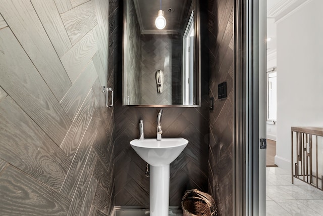 bathroom with tile patterned floors and crown molding