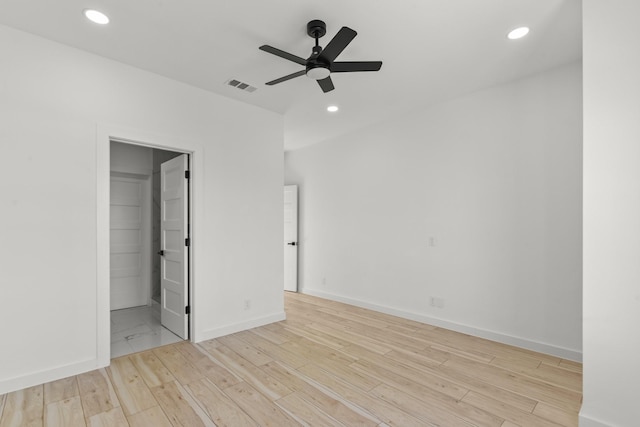 unfurnished bedroom with recessed lighting, visible vents, baseboards, and wood finished floors