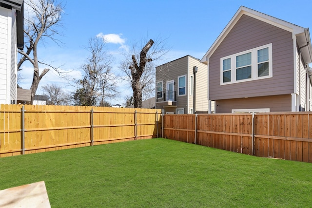 view of yard featuring a fenced backyard