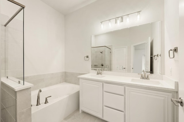 119 Emperor Oak Ct, Balch Springs, TX 75181 - full bathroom with a stall shower, a bath, and double vanity