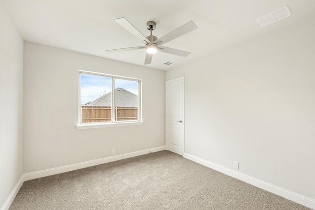 119 Emperor Oak Ct, Balch Springs, TX 75181 - carpeted empty room with baseboards and ceiling fan