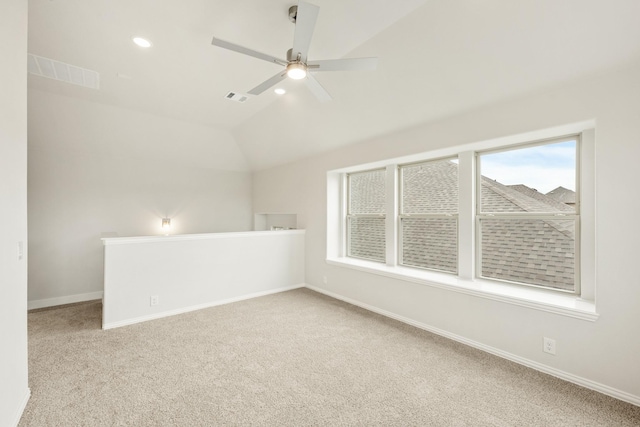 119 Emperor Oak Ct, Balch Springs, TX 75181 - unfurnished room with carpet floors, a ceiling fan, vaulted ceiling, baseboards, and recessed lighting