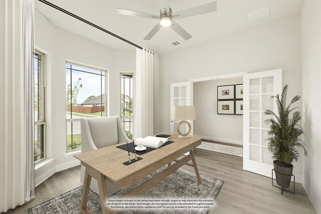 119 Emperor Oak Ct, Balch Springs, TX 75181 - office space with light wood-style flooring, a ceiling fan, and baseboards