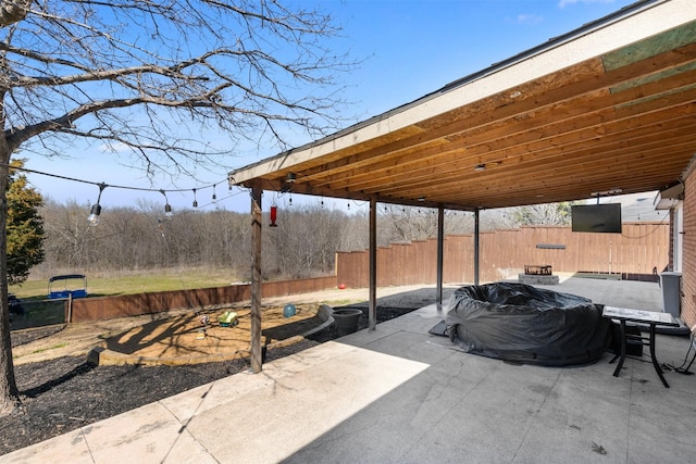 view of patio / terrace with outdoor dining space and fence