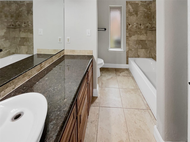 bathroom with a tub to relax in, double vanity, baseboards, tile patterned floors, and a sink