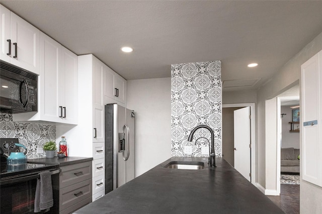 12510 Liberty School Rd, Azle, TX 76020 - kitchen featuring a sink, black appliances, white cabinets, dark countertops, and tasteful backsplash