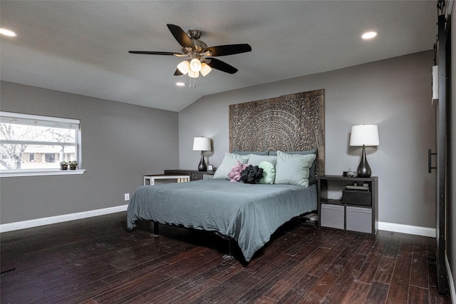 bedroom with recessed lighting, vaulted ceiling, baseboards, and wood finished floors