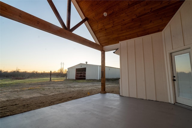 view of patio / terrace featuring an outbuilding