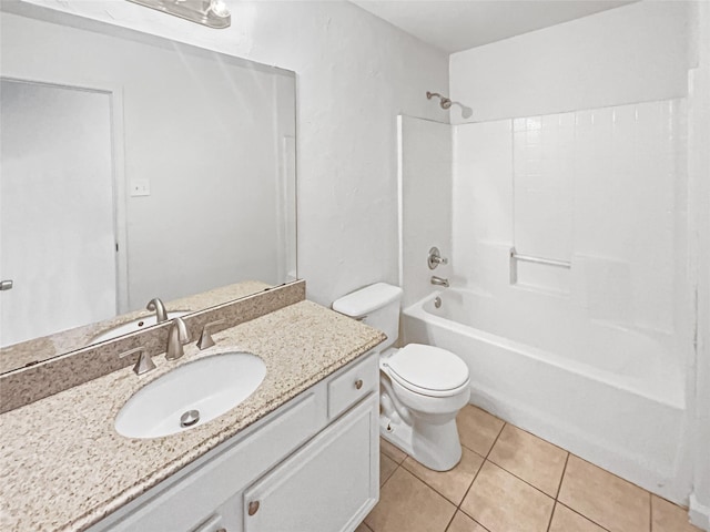 bathroom with vanity, bathtub / shower combination, tile patterned flooring, and toilet
