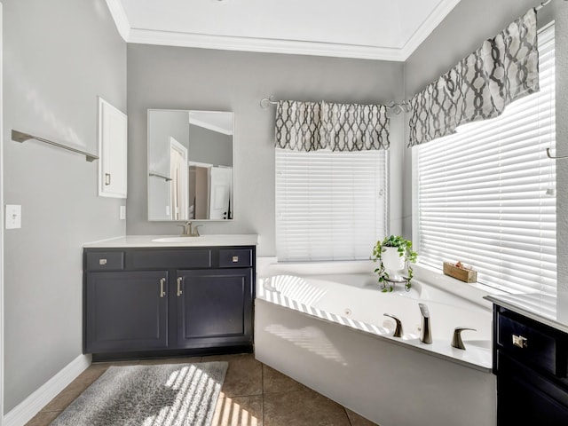 bathroom with ornamental molding, vanity, tile patterned flooring, baseboards, and a bath