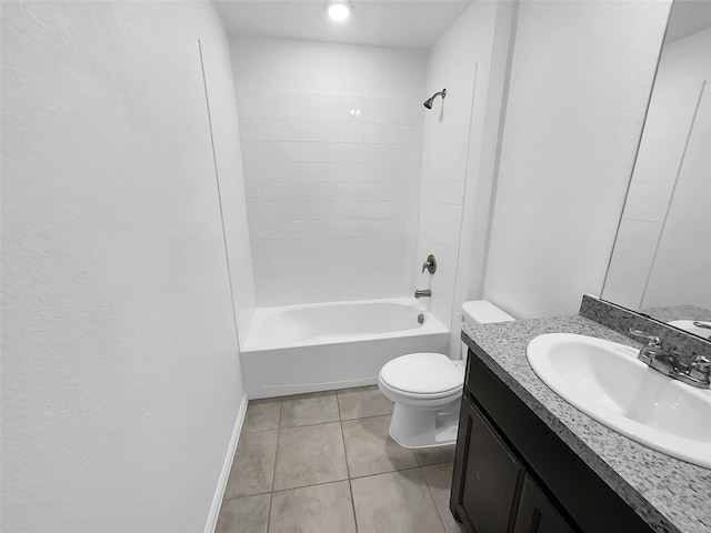 bathroom with shower / bath combination, toilet, vanity, tile patterned flooring, and baseboards