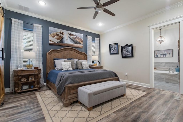 bedroom with visible vents, crown molding, and wood finished floors