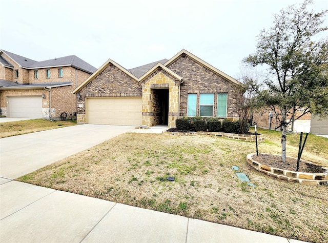 ranch-style home with a garage, brick siding, concrete driveway, stone siding, and a front yard