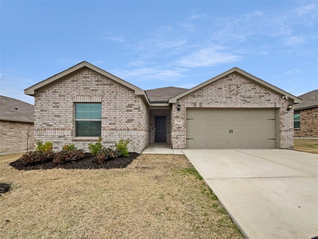 ranch-style home featuring a garage, concrete driveway, and brick siding