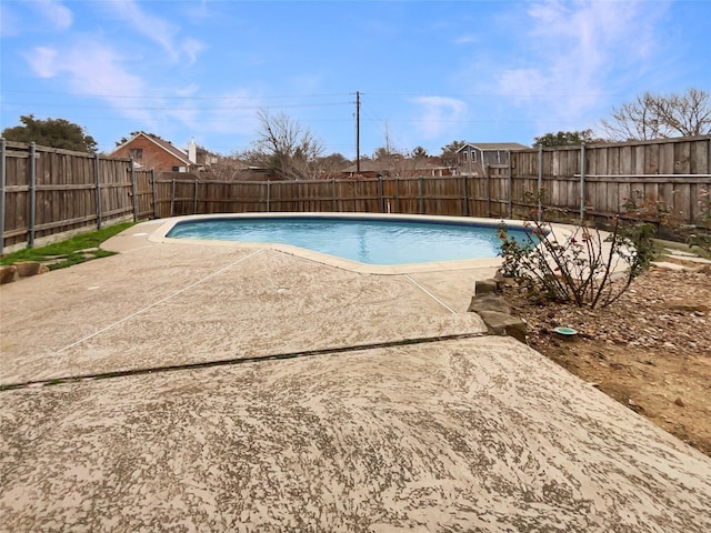 view of pool featuring a fenced backyard, a fenced in pool, and a patio