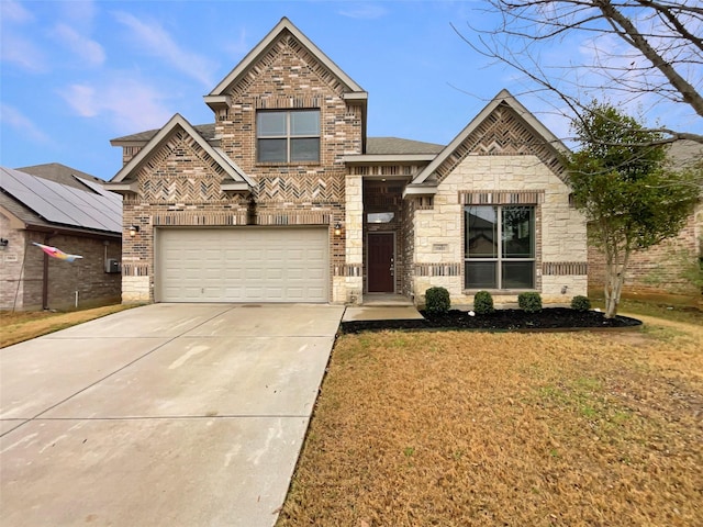 view of front of house with driveway, brick siding, and a front lawn