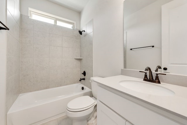 bathroom with toilet, vanity, and shower / bathtub combination