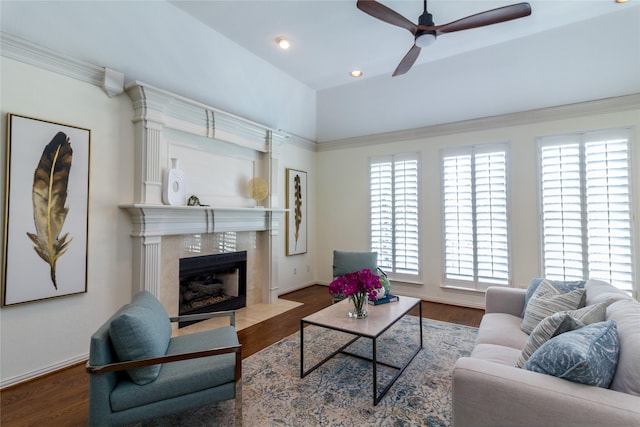 living room featuring baseboards, a tiled fireplace, a ceiling fan, wood finished floors, and recessed lighting