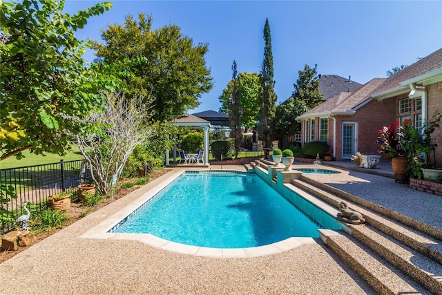 view of pool featuring a fenced in pool, an in ground hot tub, fence, a gazebo, and a patio area