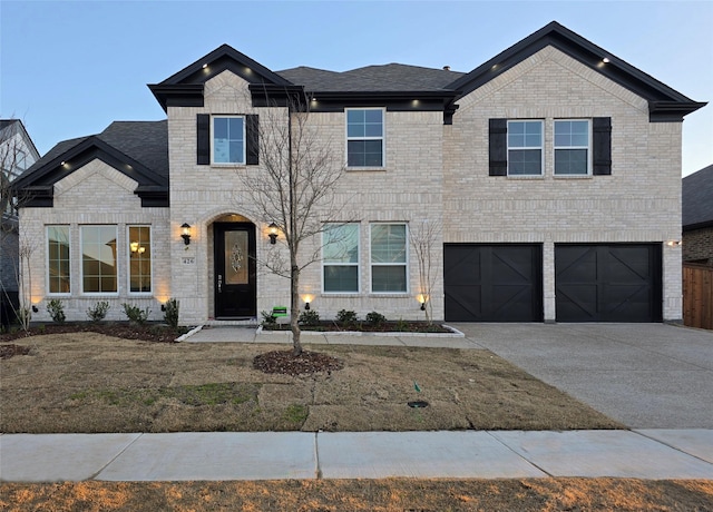 view of front of property featuring a garage, concrete driveway, brick siding, and a shingled roof