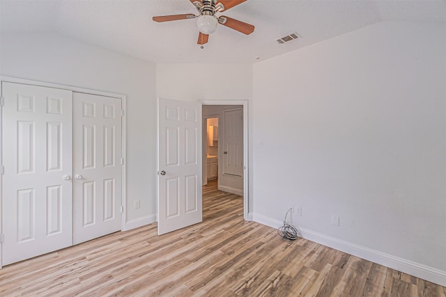 1542 Home Park Dr, Allen, TX 75002 - unfurnished bedroom with lofted ceiling, light wood finished floors, baseboards, a closet, and ceiling fan
