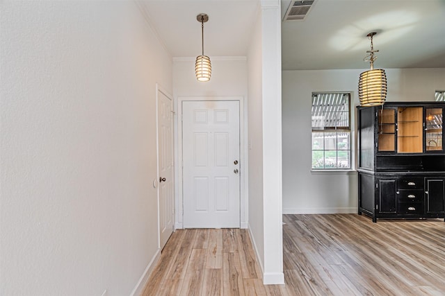 1542 Home Park Dr, Allen, TX 75002 - foyer entrance with light wood-style floors, baseboards, and crown molding