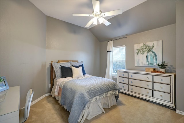 bedroom featuring light colored carpet, ceiling fan, vaulted ceiling, and baseboards