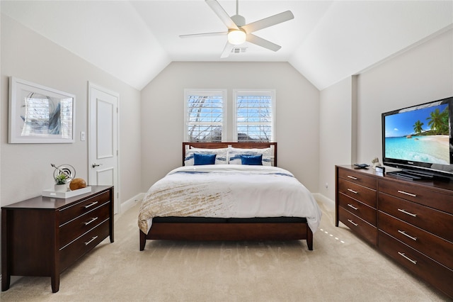 bedroom featuring lofted ceiling, light colored carpet, visible vents, ceiling fan, and baseboards