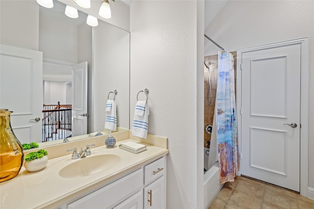 bathroom with shower / bath combo and vanity