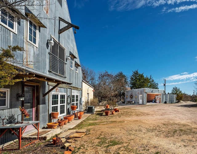 view of yard with a patio and central AC unit