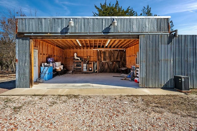 exterior space featuring a carport