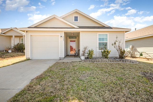 single story home featuring an attached garage, concrete driveway, and a front yard