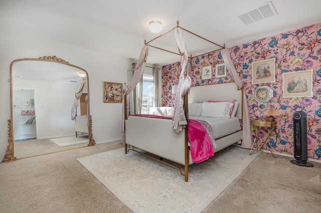 bedroom featuring baseboards, visible vents, and carpet flooring