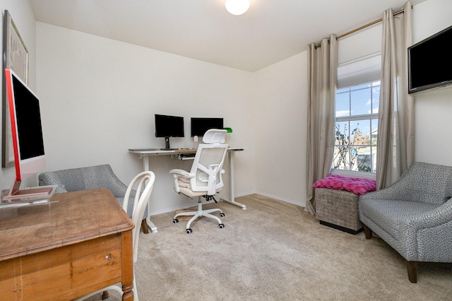 office with carpet flooring and baseboards