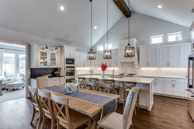 dining area with visible vents, dark wood-style floors, beamed ceiling, high vaulted ceiling, and recessed lighting