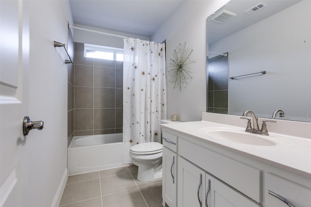 bathroom with tile patterned flooring, toilet, vanity, visible vents, and shower / bath combination with curtain