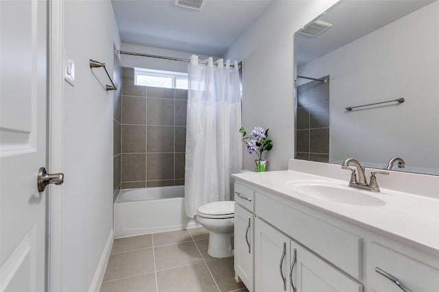 bathroom with toilet, visible vents, vanity, tile patterned floors, and shower / bath combo