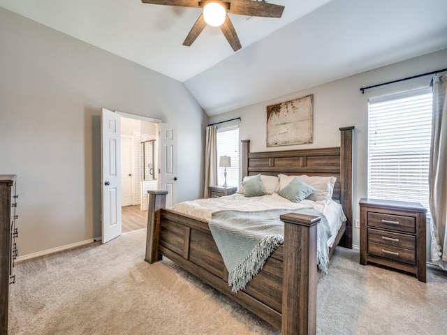 bedroom featuring light carpet, ceiling fan, lofted ceiling, and baseboards