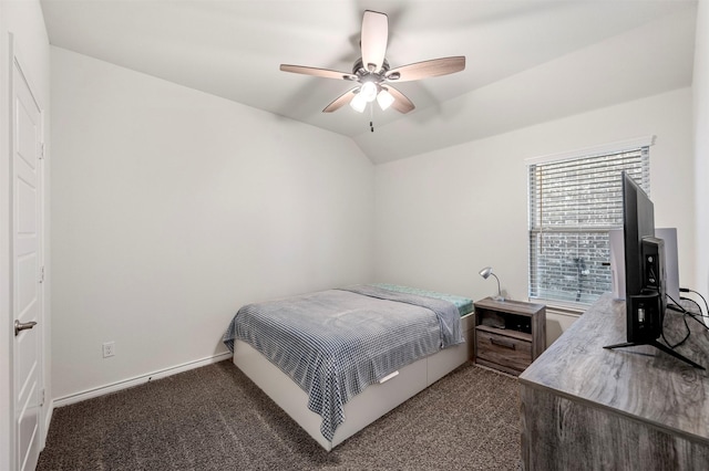 carpeted bedroom featuring lofted ceiling, ceiling fan, and baseboards